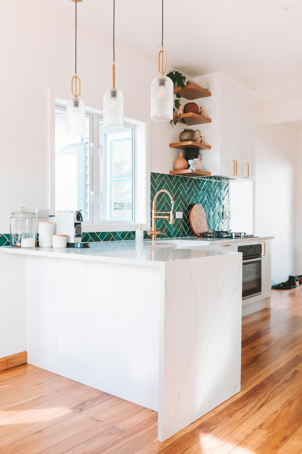 Open-concept kitchen remodel with island and pendant lighting